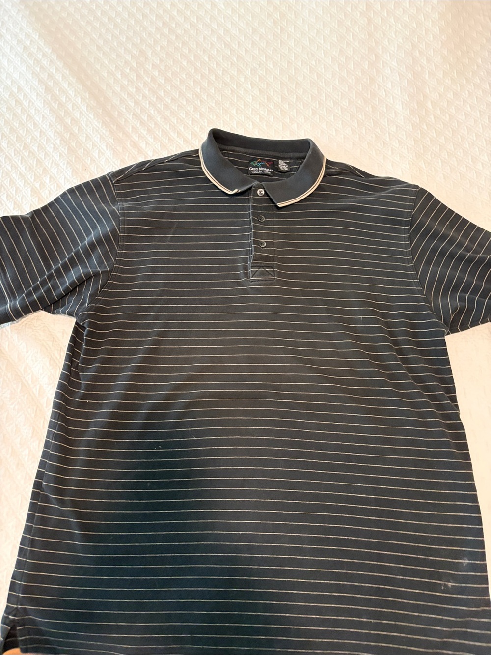 Greg Norman Collection Black Polo with Thin White Stripes and Contrast Collar